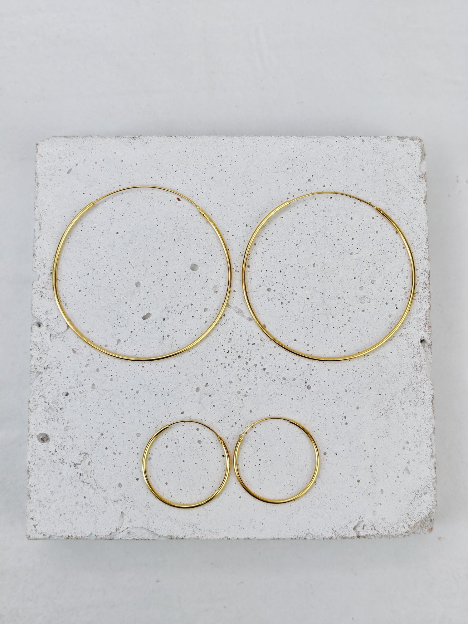 Golden hoop earrings made of 925 silver with 14 carat gold plating, gold-plated thin hoop earrings 25mm or 50 mm