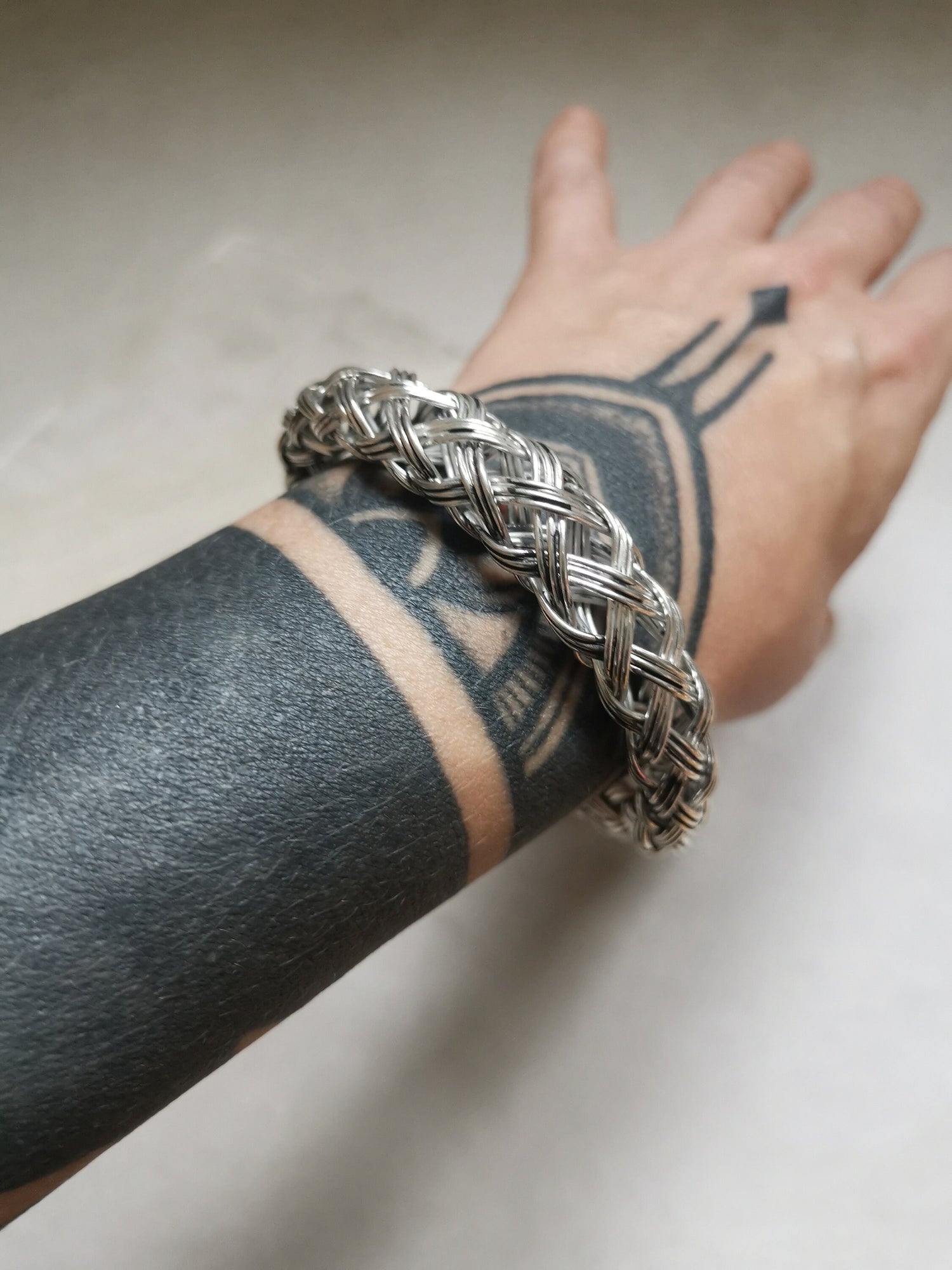 Chunky bracelet made of silver brass, statement bangle, wide bangle, braided bracelet, round bracelet